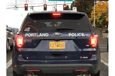 The Portland (OR) Police Department is investigating whether or not an officer with the agency is responsible for placing a Blue Line Flag sticker on the rear window of a squad car. If an officer did, in fact, apply the sticker, they may face possible disciplinary action.