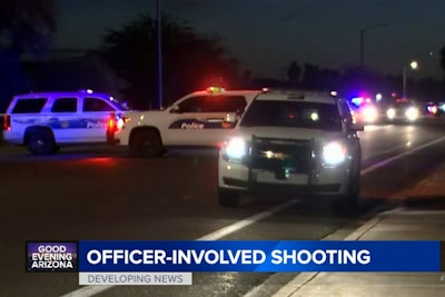 Two officers with the Phoenix Police Department were injured during a standoff with a man who had 'pistol whipped' a 69-year-old woman and threatened other residents in a home on Sunday night.