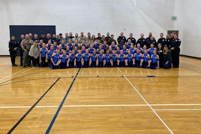 Performers with the Syracuse (UT) High School drill team appeared on the school's basketball court during a recent halftime dressed in costumes that resembled police uniforms and presented a dance that they said was in honor of law enforcement.