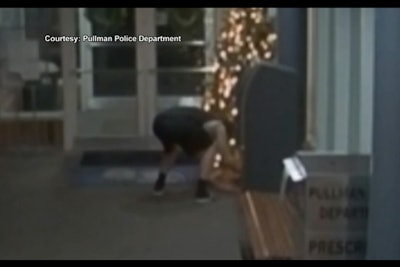 A 20-year-old college student booked into a Washington jail for underage drinking was seen on surveillance video attempting to steal packages from beneath the Christmas tree at the Pullman (WA) Police Department as he left the building.