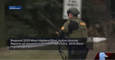 Officer responds to active shooter attack at MillerCoors headquarters in Milwaukee, WI. (Photo: WISN Screen Shot)