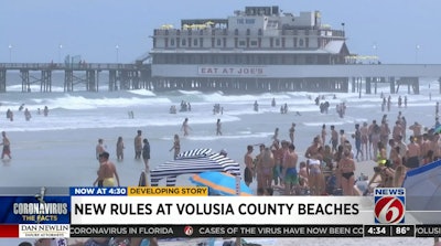 Young people are flocking to Florida beaches despite the coronavirus crisis. Police are being asked to enforce the governor's orders on social distancing. (Photo: Click Orlando Video Screen Shot)