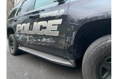 An officer with the Suffield (CT) Police Department was injured during a traffic stop when he was pinned between his patrol vehicle and another automobile during a traffic stop on Wednesday evening.