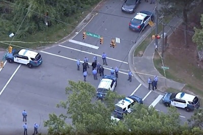 An officer with the Raleigh (NC) Police Department was struck by gunfire and fatally shot a man on Wednesday night as the assailant attempted to rob a gas station and opened fire on the officer.