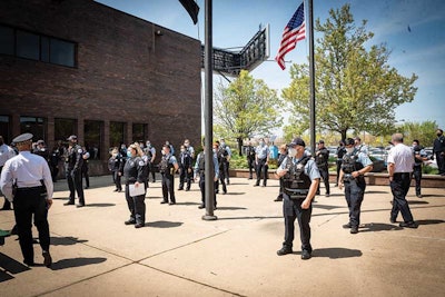 During the COVID-19 pandemic the Chicago Police Department held some of its daily briefings outside.