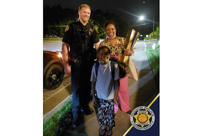 An officer with the Duluth (GA) Police Department who had come upon a woman and child walking down a rural road early Tuesday morning made a call to a car service so that they could safely get to a relative's house after their car broke down.