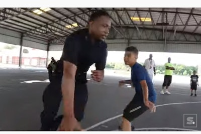 Officer Brandon Hanks has aspired to be a basketball coach for some time, and has used the game to connect with area youth while out on patrol.