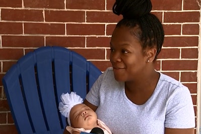 Charmaine Freeman had just finished feeding the baby and was burping her when the child became limp. She called 911 and Officer Jonathan Keeney raced to the home to perform life-saving first aid.