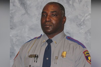 Lieutenant Troy Morris—a 27-year veteran of the Mississippi Highway Patrol who also worked part time for the United States Postal Service—was found shot dead in his delivery truck.