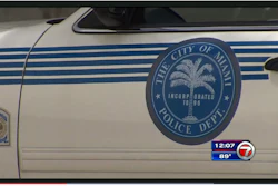The wife of an officer with the Miami Police Department perished in the back of her husband's squad car on Friday afternoon as the vehicle's temperature rose to dangerous levels and she had no way of getting out.