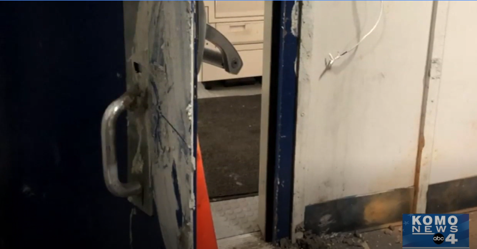 Seattle rioters reported tried to seal the doors to a precinct and burn it with officers inside Monday. (Photo: KOMO Screen Grab of Police Video)