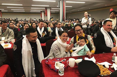 Officer Baimadajie Angwang (left) with U.S. Rep. Alexandria Ocasio-Cortez at a Tibetan New Year event in February 2019. (Photo: Instagram)