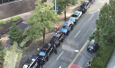 Officers and civilians line a street to honor departing Seattle Police Chief Carmen Best. (Photo: Carmen Best/Twitter)