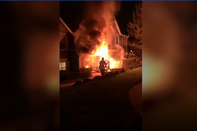 An officer with the Lisle (IL) Police Department is being lauded as a hero in the community after he rushed into a burning building, remerging into the safety of the outside with a 14-year-old boy in his arms.