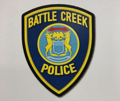 Police officers with the Battle Creek (MI) Police Department were forced to open fire on a passenger of a vehicle at a traffic stop who displayed at least one firearm in a threatening manner.