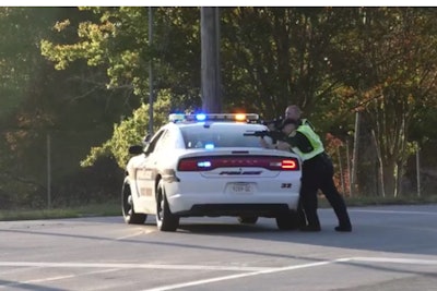 A man suspected to have opened fire on an officer with the East Ridge (TN) Police Department was reportedly fatally shot