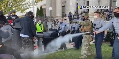 The suit accuses officers of excessive force when they pepper-sprayed the participants of a pre-election day march in Graham, NC. (Photo: ABC11)