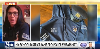 Carla Caccavale, daughter of a slain transit detective, is fighting a local school district, which employs her, over a ban on staff wearing the Thin Blue Line symbol. (Photo: Fox News)