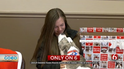 Tulsa Officer Lauren Opryszek, who helps stray dogs with supplies bought with her own money, was surprised by donations from local residents. (Photo: Newson6 Screen Shot)