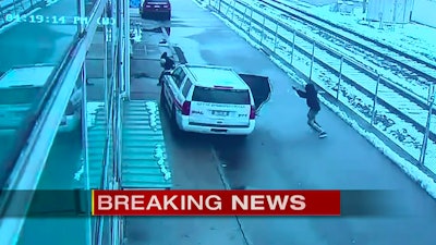Officer Gerasimos Athans came under fire when he opened his patrol car to take out the suspect. (Photo: WPIX screen shot)