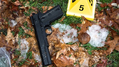 Investigators said the pellet gun brandished by Rice was 'visually virtually indistinguishable from a real .45 Colt semiautomatic pistol.' (Photo: DOJ)