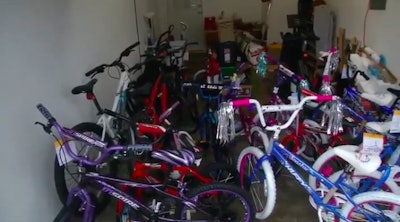 Officer Tony Messer of the South Charleston (WV) Police Department has built an online community of supporters to buy bikes for kids in his city. (Photo: WCHSTV Screen Shot)