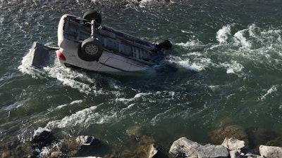 Montana Highway Patrol Trooper Conor Wager rescued a woman from this car, which was in the Yellowstone River. (Photo: Montana Highway Patrol/Facebook)