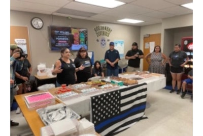 Valerie Zamarripa, the mother of fallen officer Patrick Zamarripa, brought breakfast to the Dallas Police Southwest Sub-Station. (Photo: Dallas PD)
