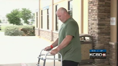 There were cheers, tears and hugs as Sgt. Shawn Wilson walked out of the facility with a walker. (Photo: KCBD screen shot)