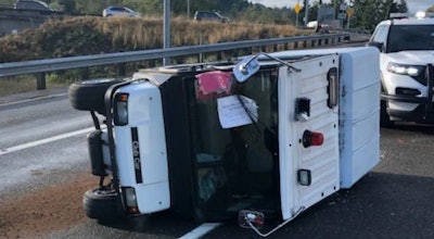 Washington State Patrol troopers used a PIT maneuver Sunday to prevent a woman driving a golf cart from entering the freeway. (Photo: WSP/Twitter)