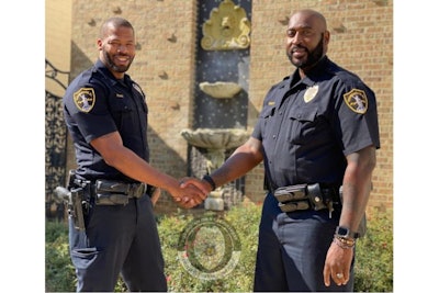 Birmingham Officers Evans and Burnett pulled a drowning woman from a vehicle submerged in flood waters last week. (Photo: Birmingham PD)