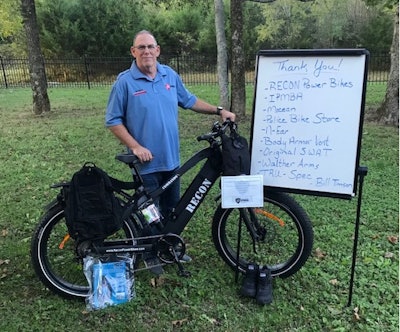 Sgt. Bill Timson with some of the products he won in POLICE's 'Outfit the Bike & Motor Officer' contest.