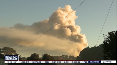 Smoke rises from an explosion and fire at house in LaGrange, GA, after a tactical standoff. (Photo: WTVM Screen Shot)