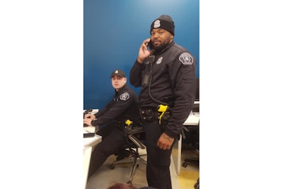 Detroit Officers Flannel and Parrish are credited with rescuing four kidnapped children. (Photo: Detroit PD/Facebook)