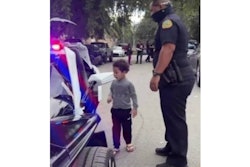 Miami police officers brought gifts to a three-year-old assault victim Friday. (Photo: Miami PD/Facebook)