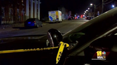 A Baltimore police officer was ambushed and critically wounded in her patrol vehicle Thursday. (Photo: WBAL screen shot)