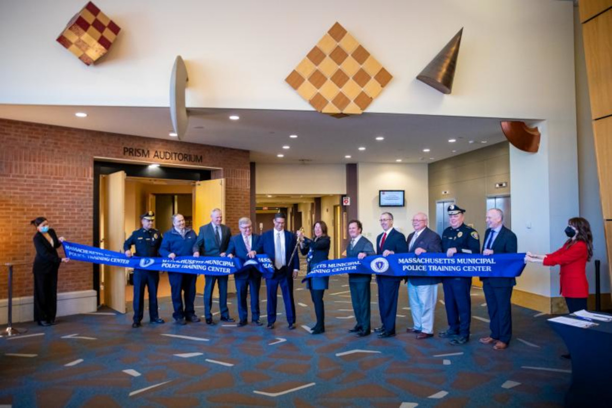 Officials cut the ribbon at a new Municipal Police Training Center in Massachusetts. Photo MTTC