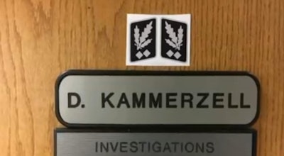 Kent, WA, Assistant Police Chief Derek Kammerzell is facing calls for his resignation after posting SS rank insignia on his door. (Photo: KING5 screen shot)