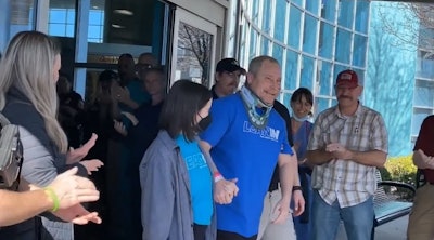 Wounded Joplin, MO, police officer Rick Hirshey leaves the hospital, walking to his vehicle with the help of family. (Photo: Joplin PD Video screen shot)