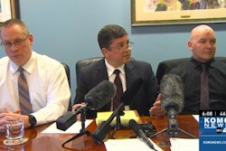 Whatcom County Sheriff's deputies Jason Thompson (left) and Ryan Rathbun (right) meet with the press about their lawsuit filed by attorney Daniel Horne (center). (Photo: KOMO News screen shot)