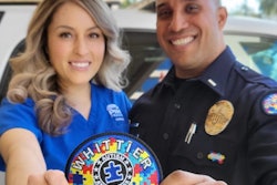 Lt. Brian Corletto and wife Norma showcase the Whittier Police Department autism patch they designed.