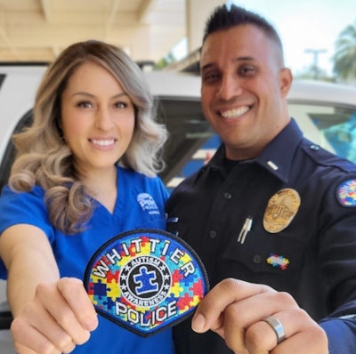 Lt. Brian Corletto and wife Norma showcase the Whittier Police Department autism patch they designed.