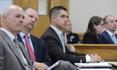 Idaho Falls Police Officer Elias Cerdas is shown with his defense team as he listens to proceedings during his trial earlier this week.