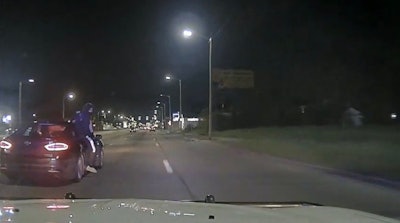 Detroit Police posted images captured by dashcam when a suspect fired at officers during a pursuit.