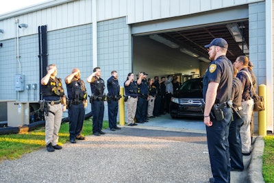 Tallahassee officers honor the fallen officer in a photo released this morning by the city.