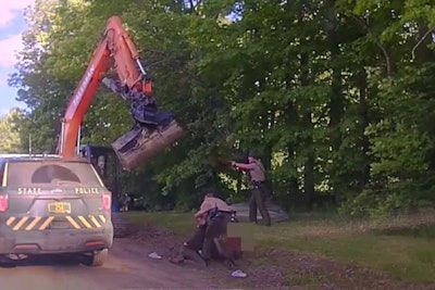 Vermont State Police troopers were menaced by a man operating an excavator during an arrest. (Photo: Screen Shot from VSP Video)