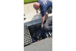 Montgomery County Police officer H. Chen rescued ducklings from a local storm drain with the aid of firefighters. (Photo: Montgomery County PD)