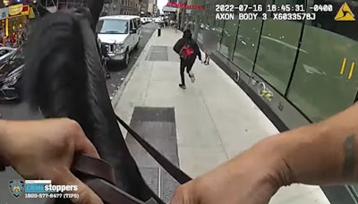 Body-worn camera video released by the NYPD shows a mounted officer pursue a theft suspect fleeing through Times Square.