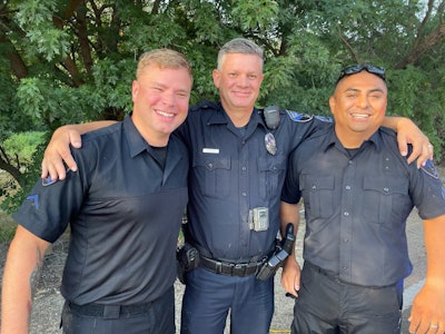 Caldwell Police Department officers are shown following their rescue of a man stranded in the Boise River and found clinging to a downed tree.