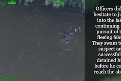 Two Atlanta police officers apprehend a suspect who tried to flee from arrest by swimming across a lake.